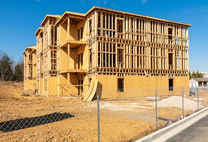 a snapshot of temporary chain link fences protecting a large construction project from unauthorized access in Edison NJ